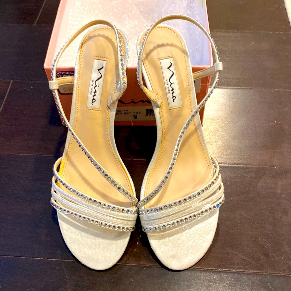 Sparkly silver strappy heels.